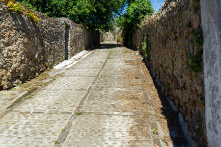 Steep climb on the old street in the village of Spain, Basque Countryの写真素材