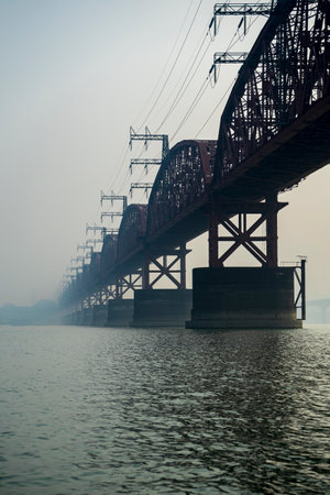 Hardinge Bridge in fog steel railway truss bridge over the Padma River, Bangladesh