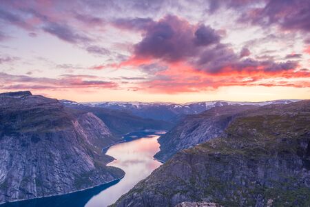 02/09-17, Trolltunga, Norway.  View from the General area of Trolltunga during a sunset. The lake is called Ringrdalsvatnet and is the main reservoir for the hydroelectric power station in Tyssedal.の写真素材