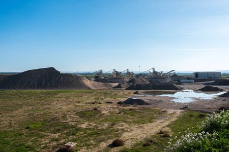 February 19, 2020 - Belianes-Preixana, Spain. A Gravel pit with heavy machinery on the edge of the SPA (Special protected area) Belianes-Preixana.の写真素材