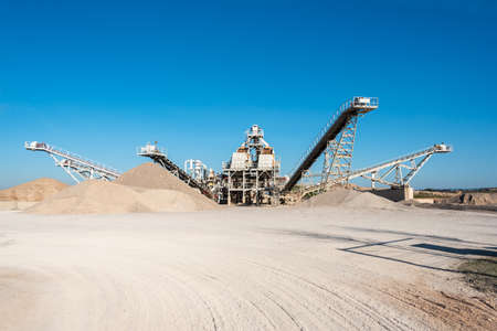 February 19, 2020 - Belianes-Preixana, Spain. A Gravel pit with heavy machinery on the edge of the SPA (Special protected area) Belianes-Preixana.のeditorial素材