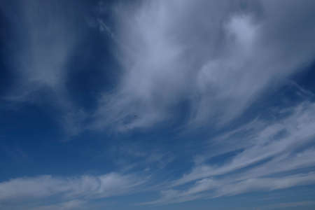 the boundless expansion of the sky with cumulus clouds and rays of the sun, moments of daybreak and...