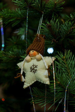 a Christmas toys on the branches of the Christmas tree, New Year's Christmas decor, New Year's balls...