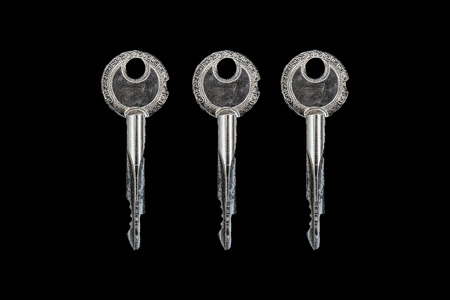 Three Keys on Black Background