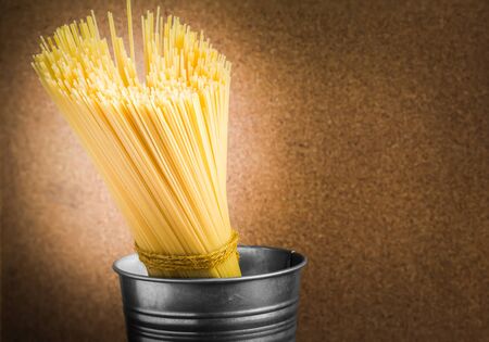 spaghetti uncooked in bucketの写真素材