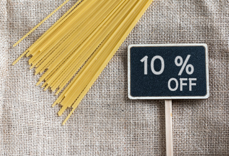 Spaghetti uncooked and sale 10 percent off drawing on blackboardの写真素材