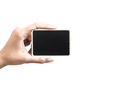 Hand hold a blackboard on white backgroundの写真素材