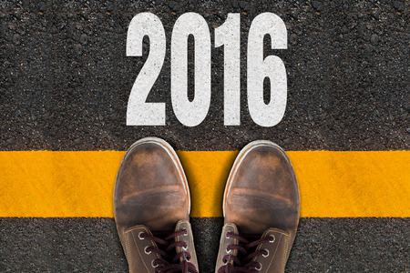 Shoes over Yellow Line   and 2016 Printed On The Roadの写真素材