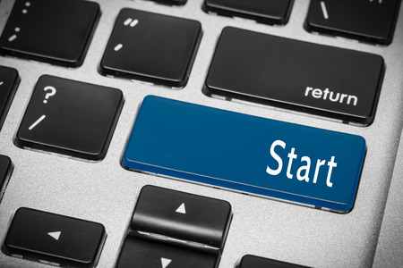 Blue start button on the keyboardの写真素材
