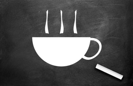 Chalk and coffee cup  write on chalkboard backgroundの写真素材