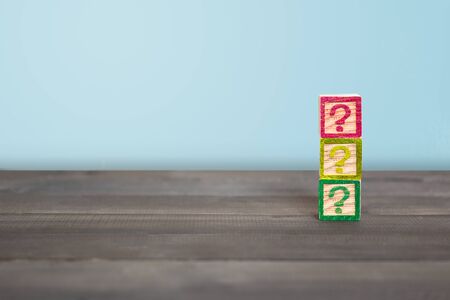 Question mark block on wood table ,  Problem Conceptの写真素材