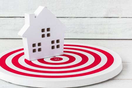 Wood Home Shaped on dartboard. Select Home Conccept.の写真素材