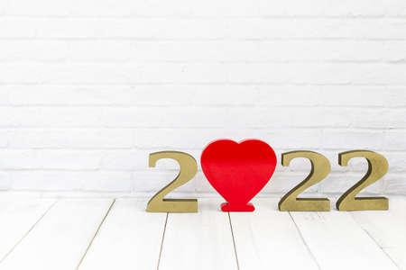 2022 new year and heart  on white wood table over white background with copy space , love conceptの写真素材