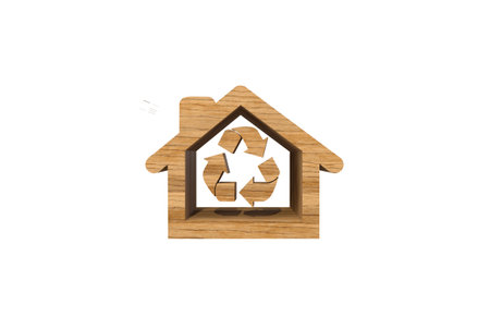 Wooden House with Recycle Arrow Sign on white backgroundの写真素材