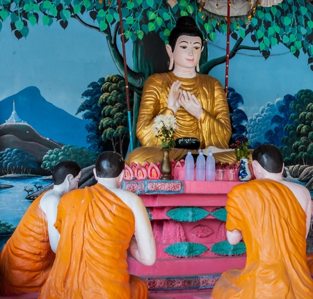 The statue of Buddha is giving a sermon to followersのeditorial素材