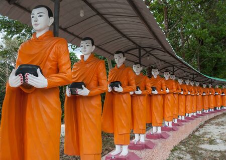 Food offering to a monk is culture of Buddhismのeditorial素材