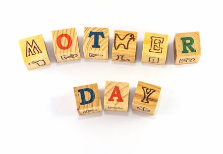 The idea picture of mother day wording that make of wooden block, simple toy of childrenの写真素材