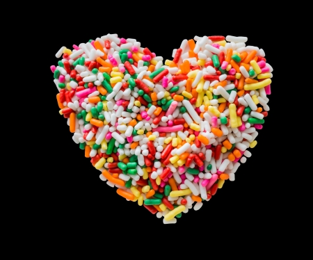 Picture of heart that make by colorful cake decorative candyの写真素材