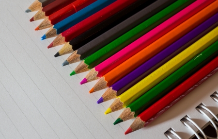 Object style picture ot the colorful pencil and page of diaryの写真素材
