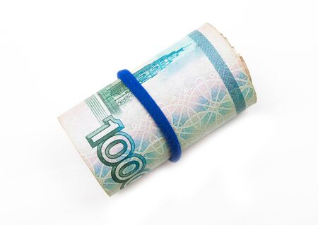 a bundle of russian 1000 rubles bills in an oval can, clipping pathの写真素材
