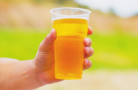 Beer in a plastic cupの写真素材