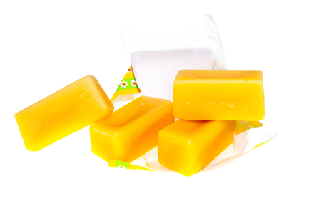 sweet milk candy on a white backgroundの写真素材