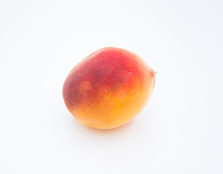 isolated peach on whiteの写真素材