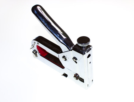 Stapler on white background