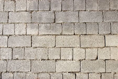 cinder block brick wall and concrete floor as background