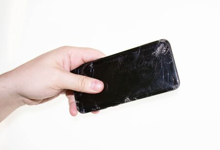phone in hand on a white backgroundの写真素材