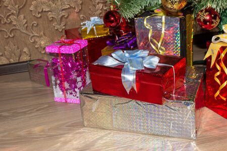 Christmas toys under the tree waiting for the new yearの写真素材
