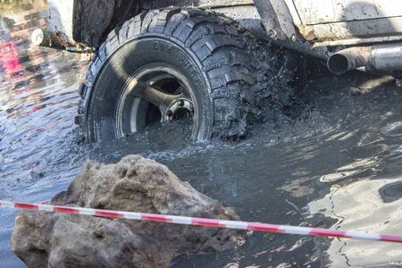 Kazakhstan, Shymkent, October 22, 2017: Wrangler Sahara jeep competition on the bank of a forest...