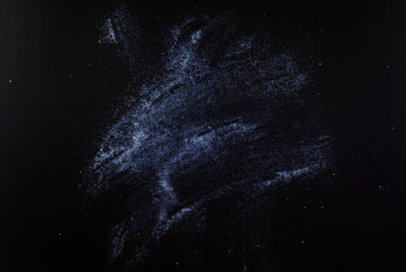 abstract white dust on a black background.