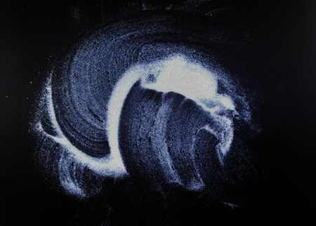 abstract white dust on a black background.