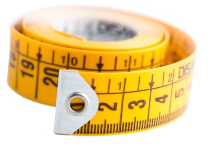 Isolated yellow metric tape on white background