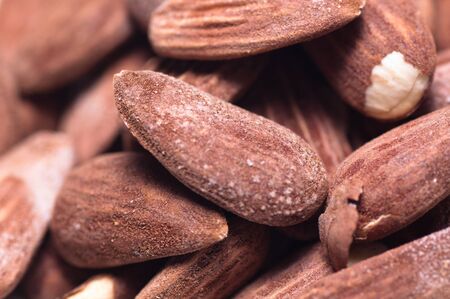 Closeup of several salted and toasted almondsの写真素材