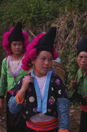 Young girls red pompons Hmong	の写真素材
