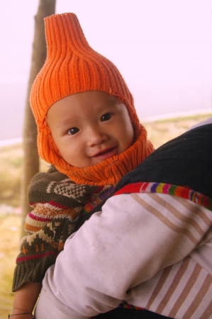 Thai baby in back his motherの写真素材