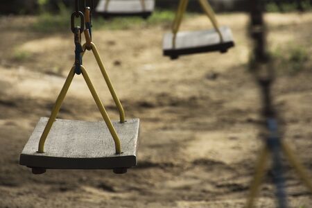 The swings in the playgroundの写真素材