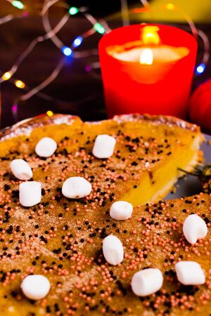 Pumpkin Pie Traditional Thanksgiving Tasty Tart. Autumnal Food Background with Hand Made Baked Cakeの写真素材