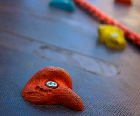 Climbing wall stone close up view. Sport and active lifestyle equipment. Park and outdoor kids...