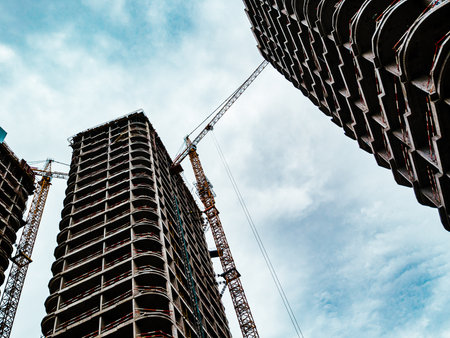 Modern buildings development, working at skyscaper building construction