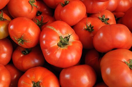 stall of tomatoes at the marketの写真素材