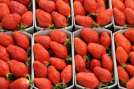 stall of strawberries at the marketの写真素材