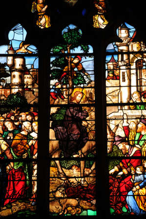 France, stained glass window in the church Saint Martin of Trielのeditorial素材