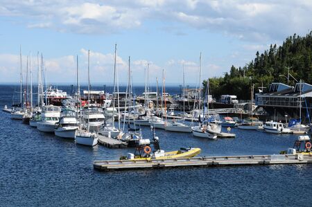 Canada, Quebec, boats in the port of Tadoussac の写真素材