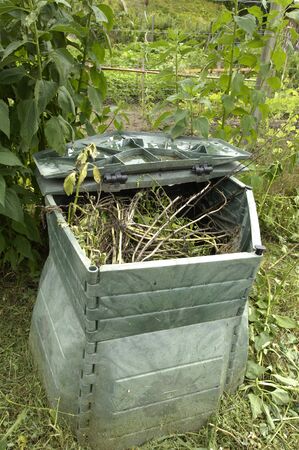 compost barrel in a garden