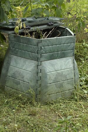 compost barrel in a garden