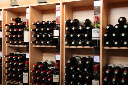 France, Aquitaine, bottles of Bordeaux in a shop