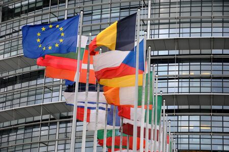 France, flags and the European Parliament of Strasbourgのeditorial素材